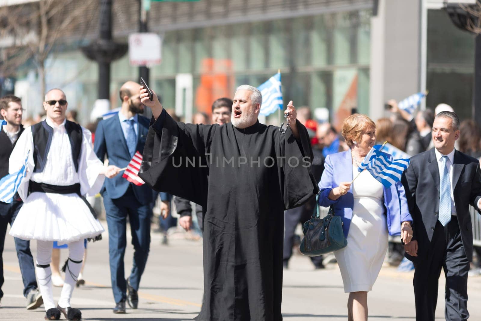 Chicago, Illinois, USA - April 29, 2018  An orthodox priest in the Greek Independence  Day Parade