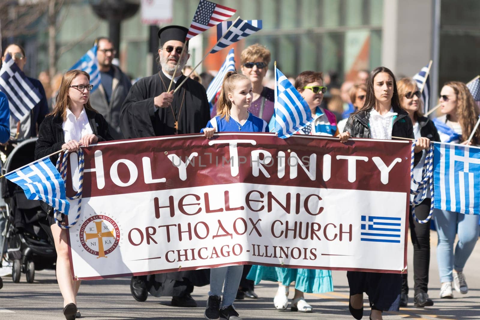 Chicago, Illinois, USA - April 29, 2018  Member of the holy Trinity Hellenic Orthodox Church at the Greek Independence  Day Parade