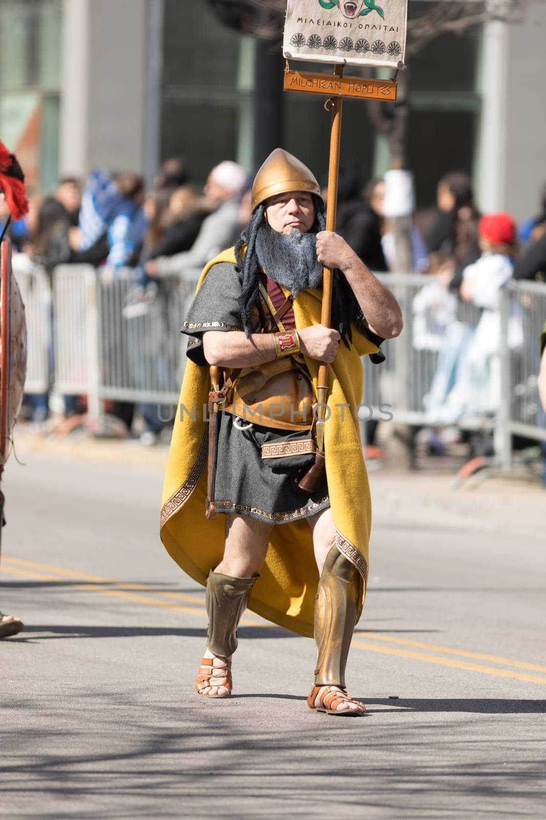 Chicago, Illinois, USA - April 29, 2018 Greek man dress up as spartan at the Greek Independence  Day Parade
