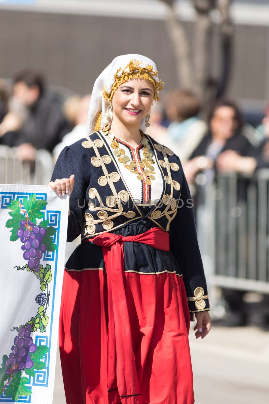 Chicago, Illinois, USA - April 29, 2018 Greek woman wearing traditional clothing during the Greek Independence  Day Parade