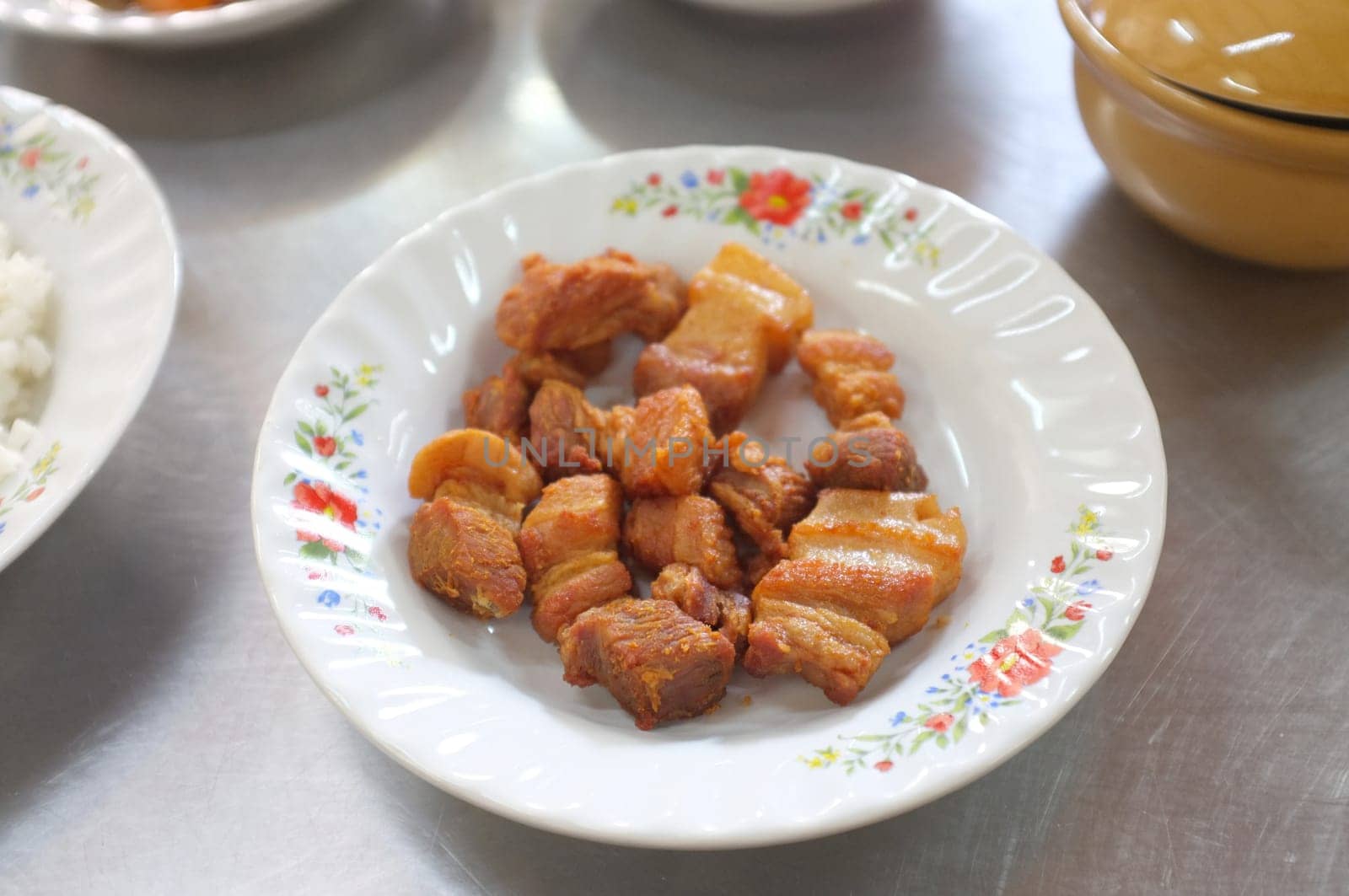 Deep fried pork belly with fish sauce , Thai food
