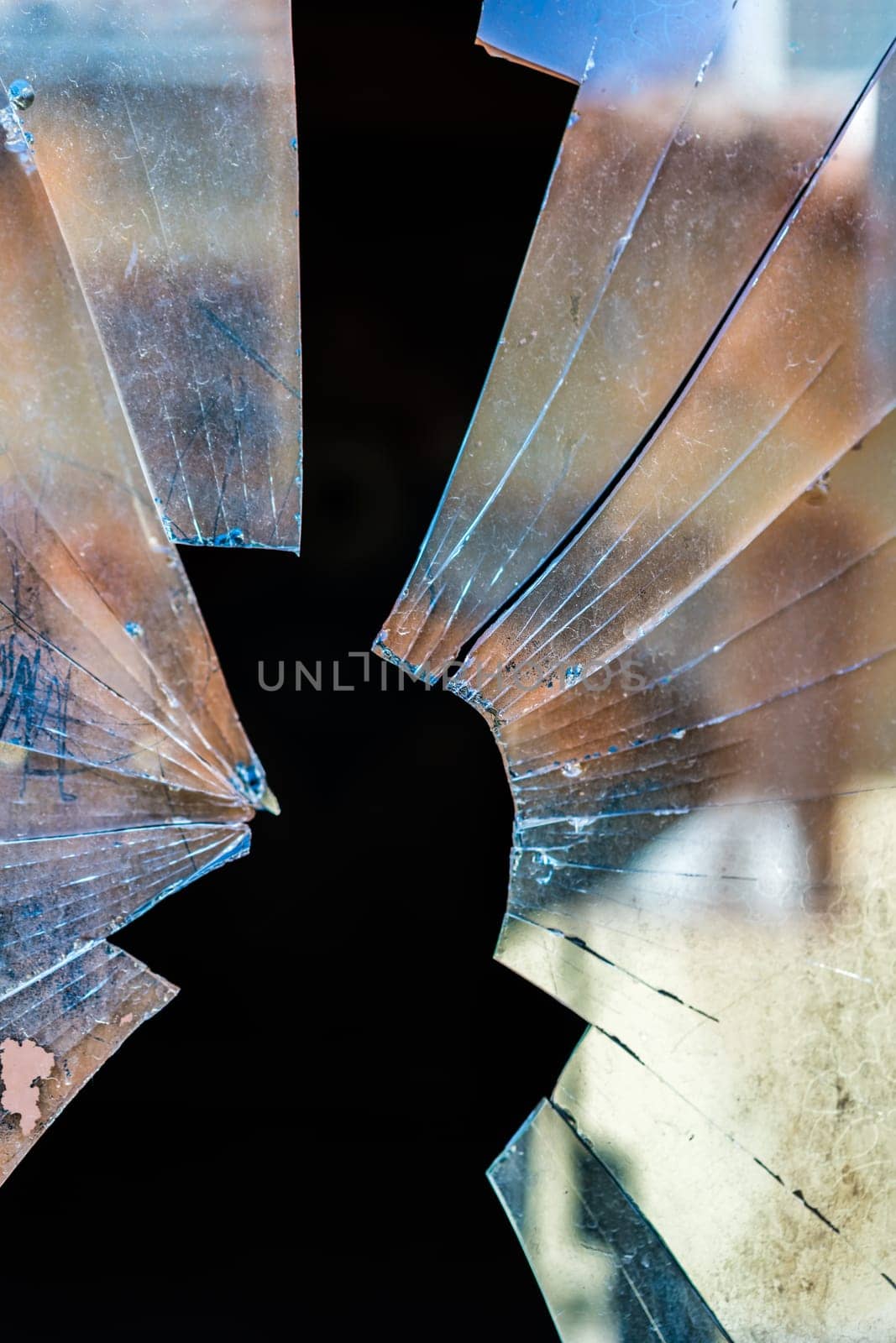 Shattered door glass window with sharp edges