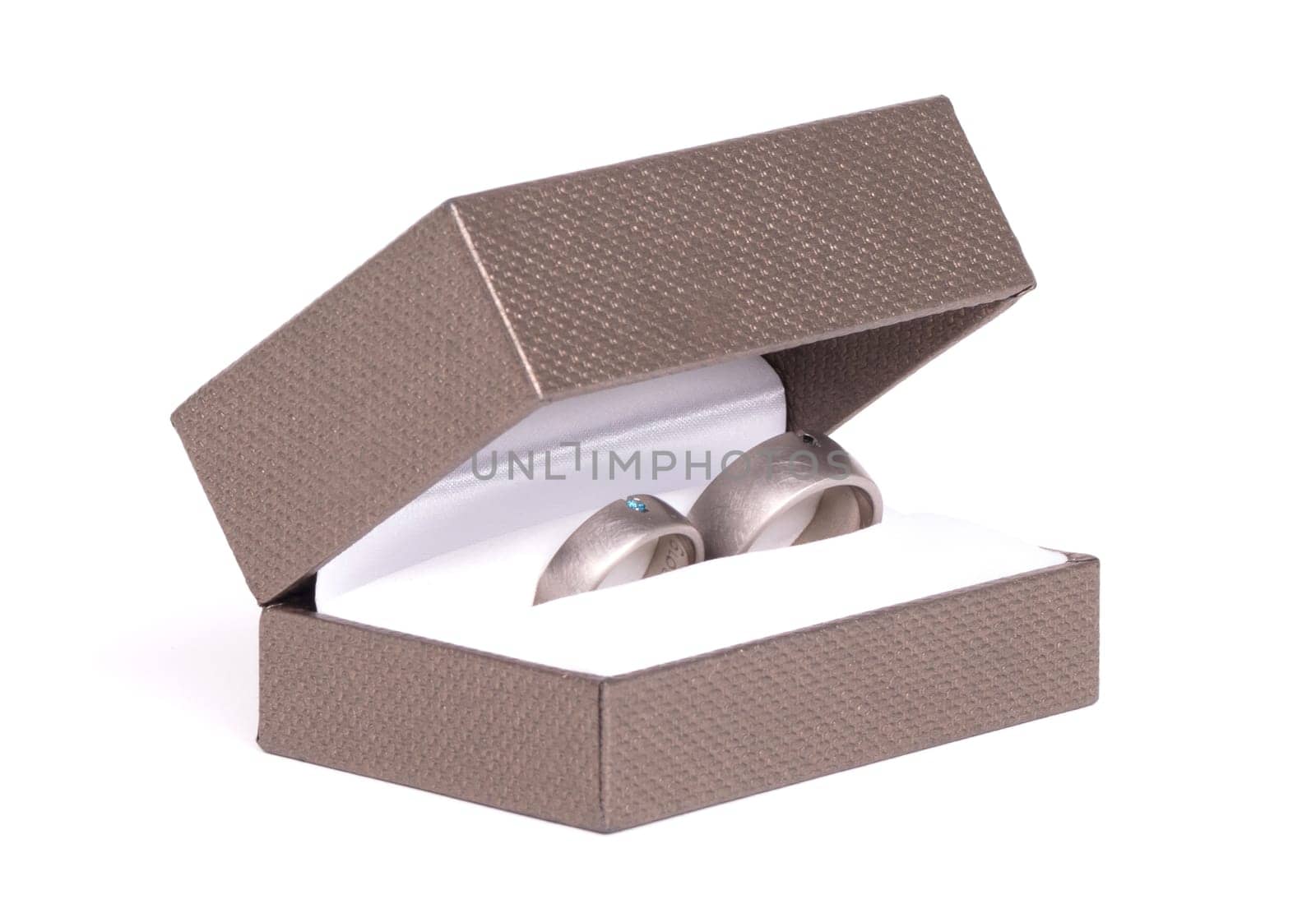Wedding ring in box, isolated on white background