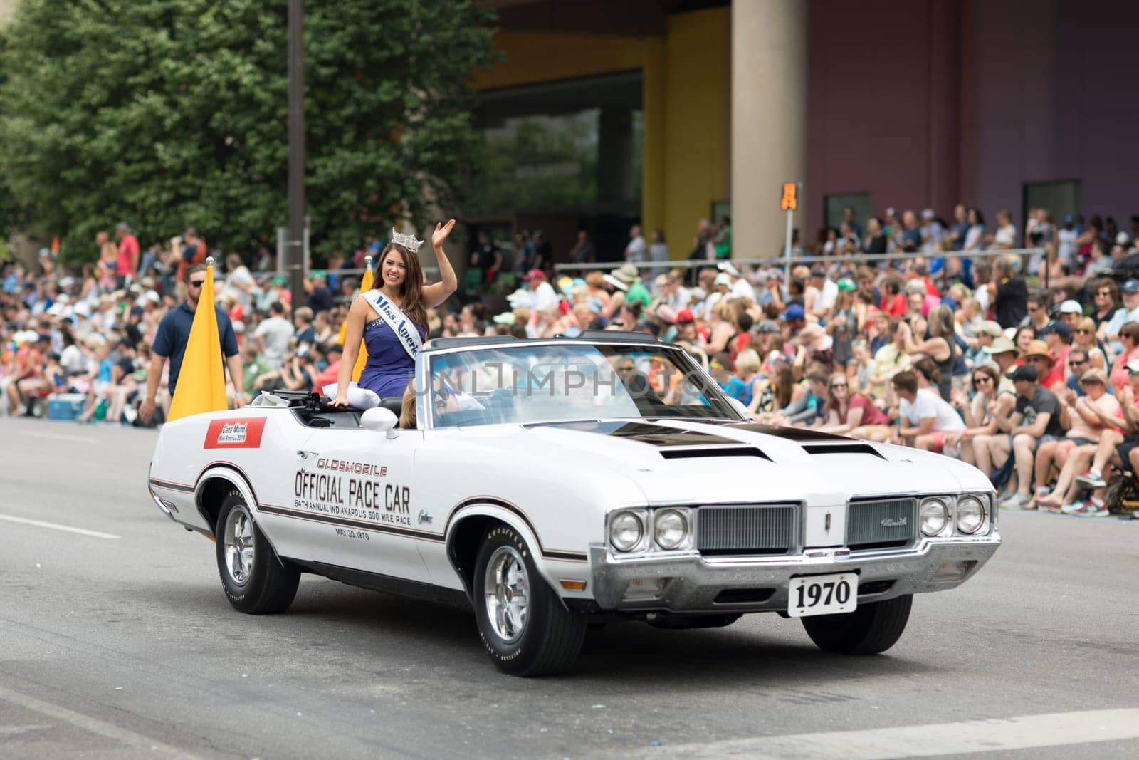 Indianapolis, Indiana, USA - May 26, 2018, Cara Mund, Miss America 2018 riding on an Oldsmobile 1970 classic car, at the Indy 500 Parade