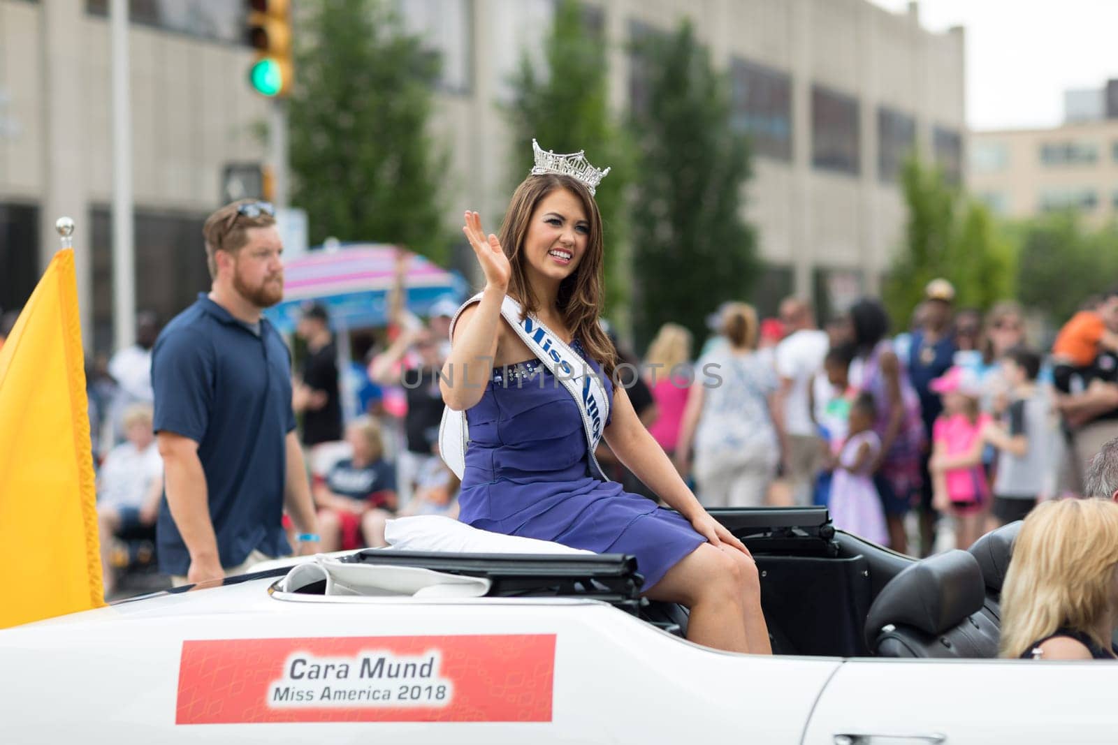 Indianapolis, Indiana, USA - May 26, 2018, Cara Mund, Miss America 2018 riding on an Oldsmobile 1970 classic car, at the Indy 500 Parade