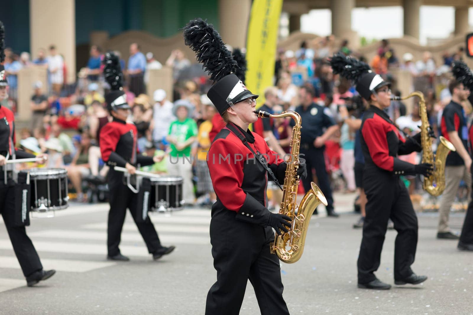 Indianapolis, Indiana, USA - May 26, 2018,  Members of the NorthWood High School Red Regiment perform at the Indy 500 Parade