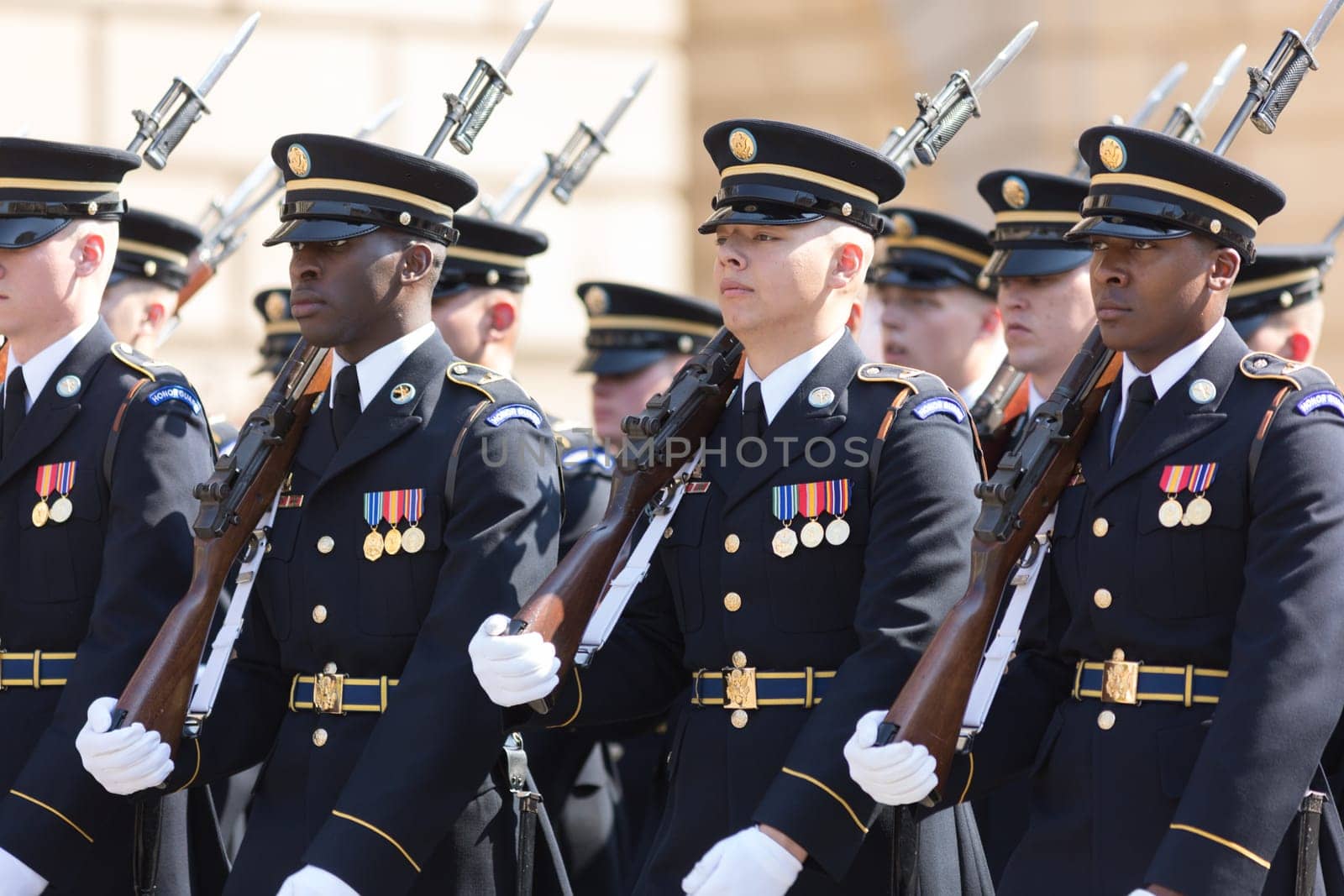 Washington, D.C., USA - April 14, 2018 Members of the USA military marching in the 2018 National Cherry Blossom Parade