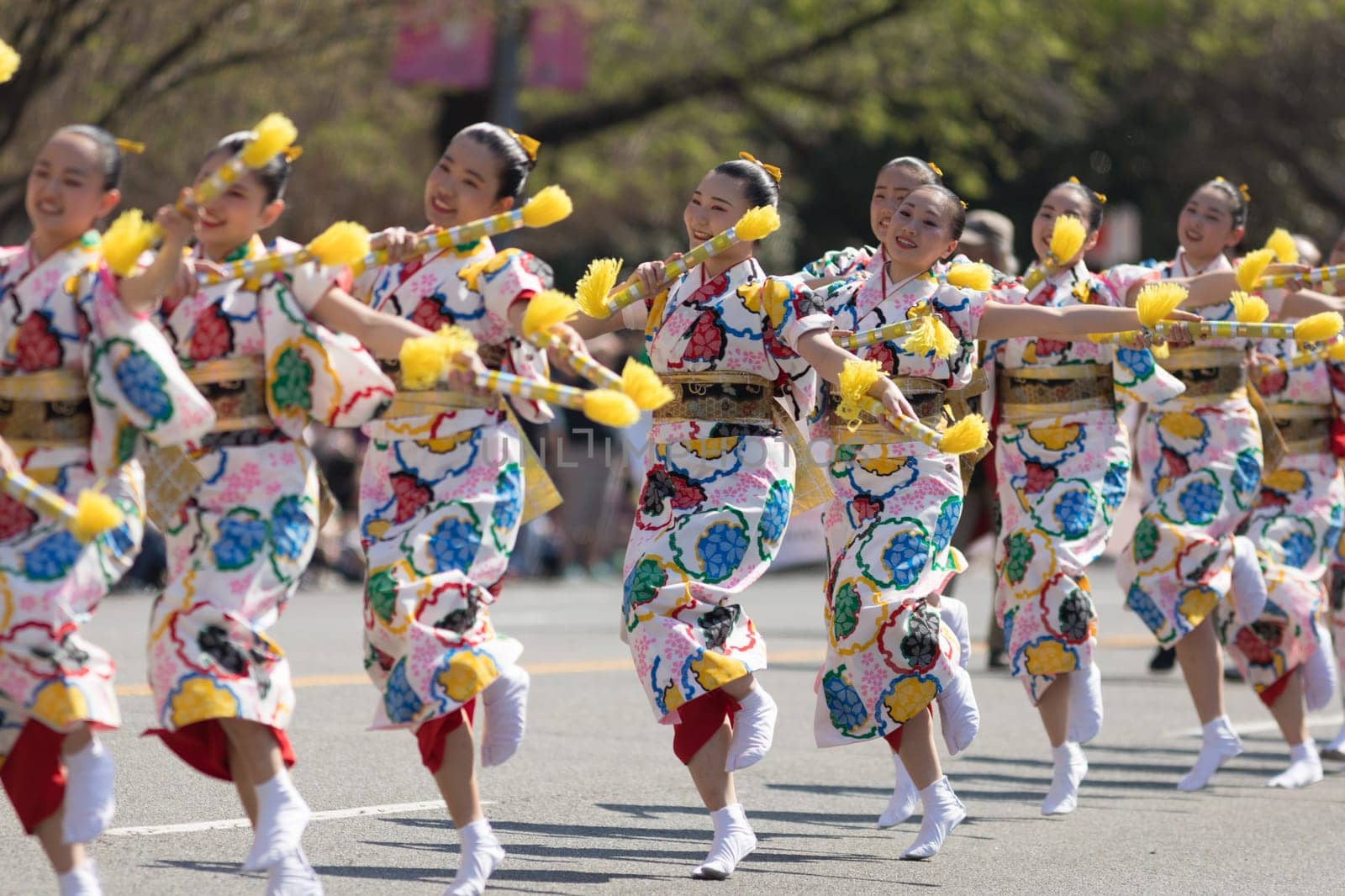 Washington, D.C., USA - April 14, 2018 Japanese women wearing kimonos and dancing in the 2018 National Cherry Blossom Parade