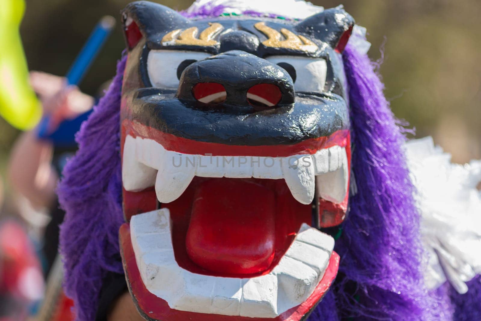 Washington, D.C., USA - April 14, 2018 People wearing a dragon cotume in the 2018 National Cherry Blossom Parade