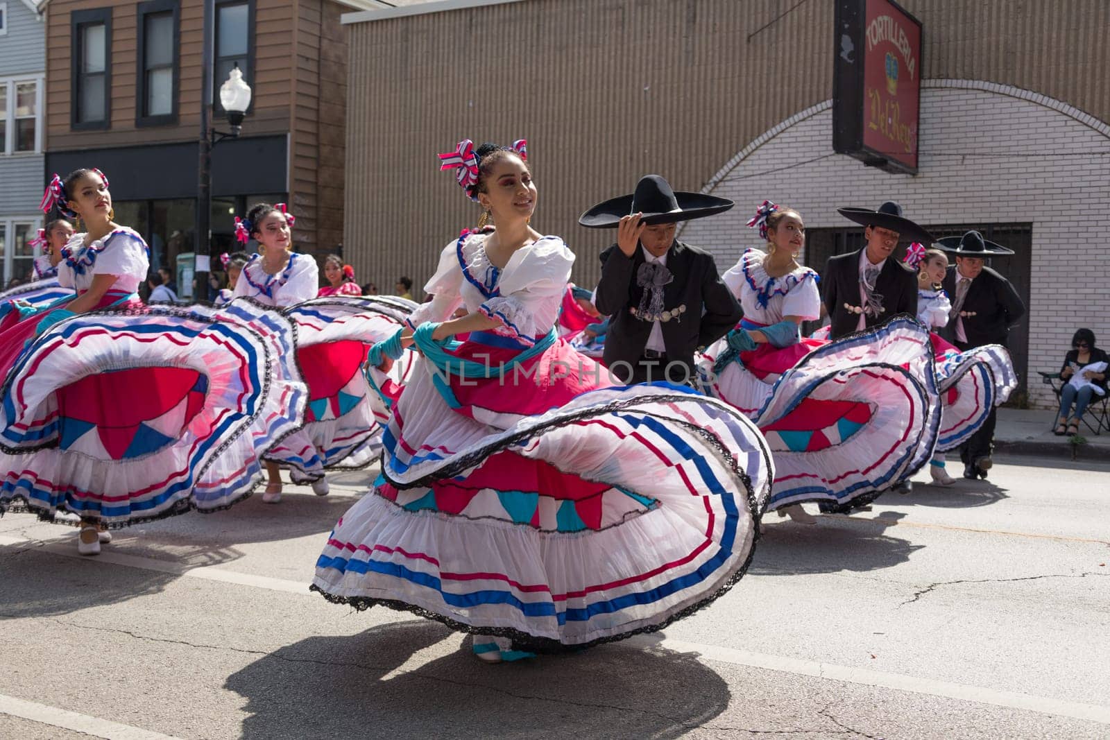 Chicago, Illinois, USA - September 16, 2017 - The Pilsen Mexican Independence Day Parade commemorates the Mexican Independence It features traditional folkloric, equestrian and Aztec dancing.