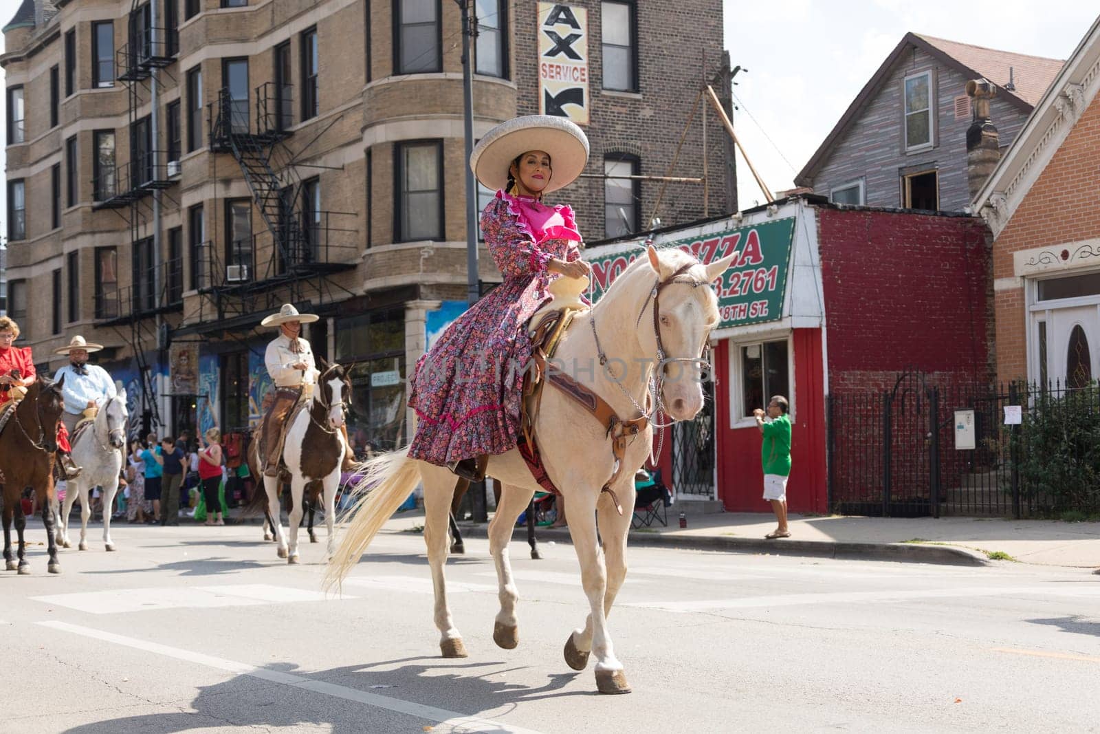Chicago, Illinois, USA - September 16, 2017 - The Pilsen Mexican Independence Day Parade commemorates the Mexican Independence It features traditional folkloric, equestrian and Aztec dancing.