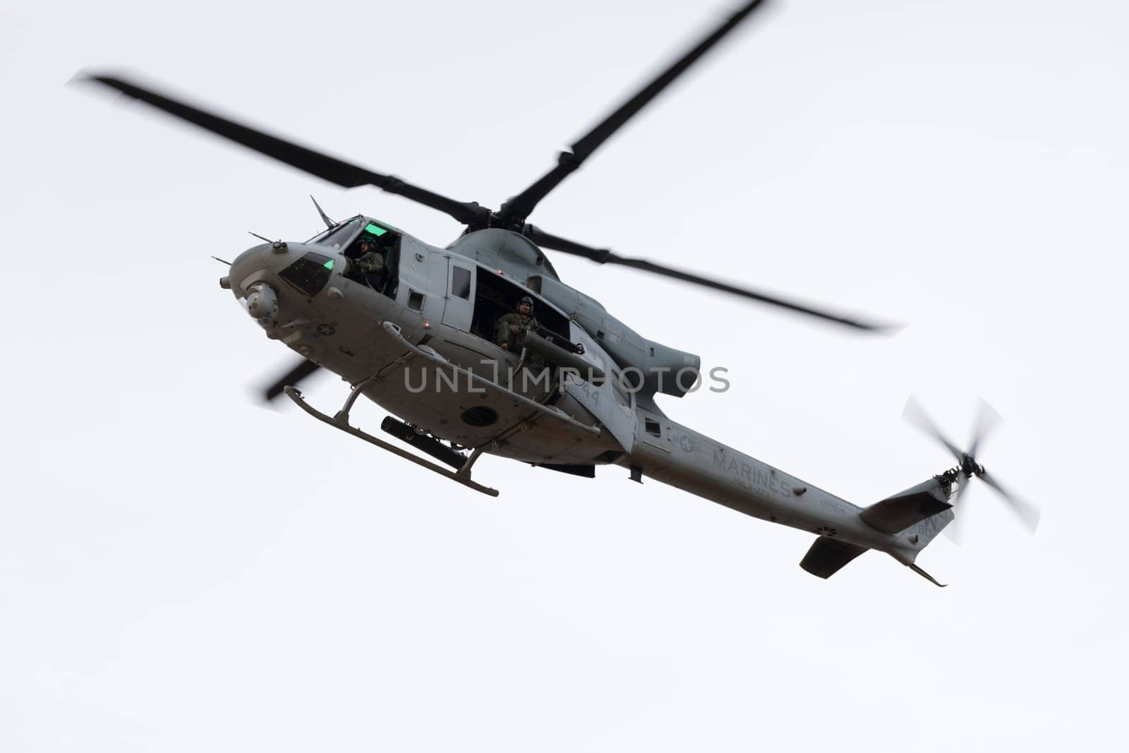 Louisville, Kentucky, USA - April 21, 2018 UH-1 Iroquois transport helicopter fly by at the Thunder Over Louisville