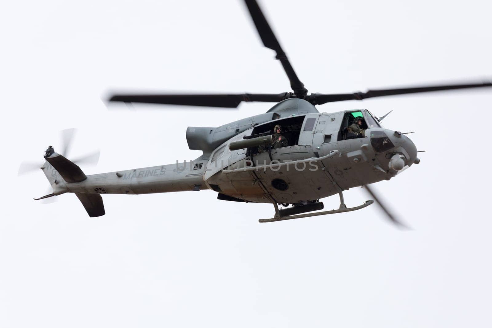Louisville, Kentucky, USA - April 21, 2018 UH-1 Iroquois transport helicopter fly by at the Thunder Over Louisville