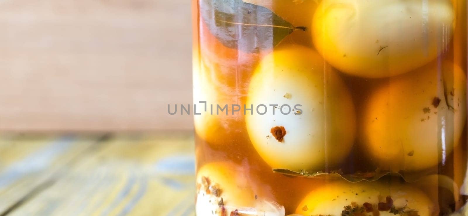 Pickled eggs in the glass jar