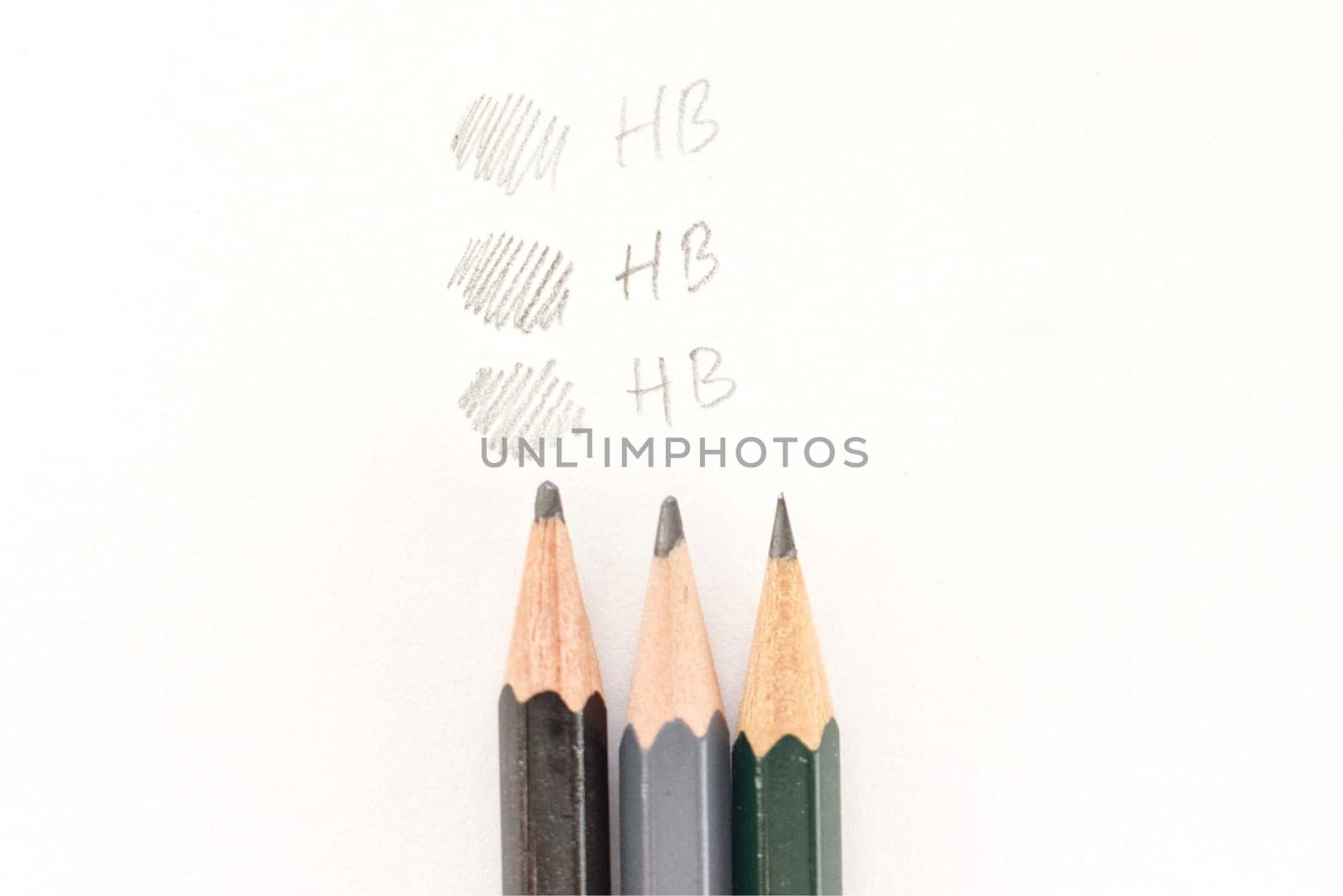 three pencils side by side with different strokes by the same number