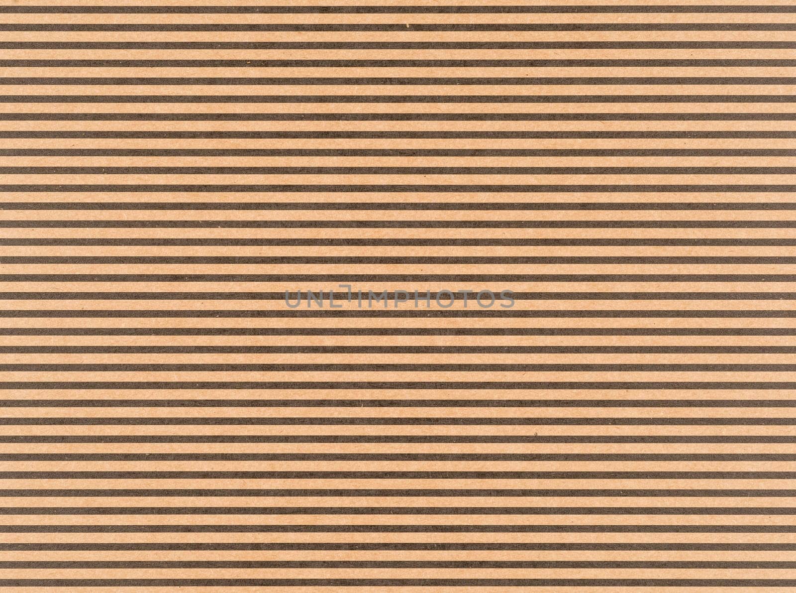 Brown craft paper with a black horizontal stripes