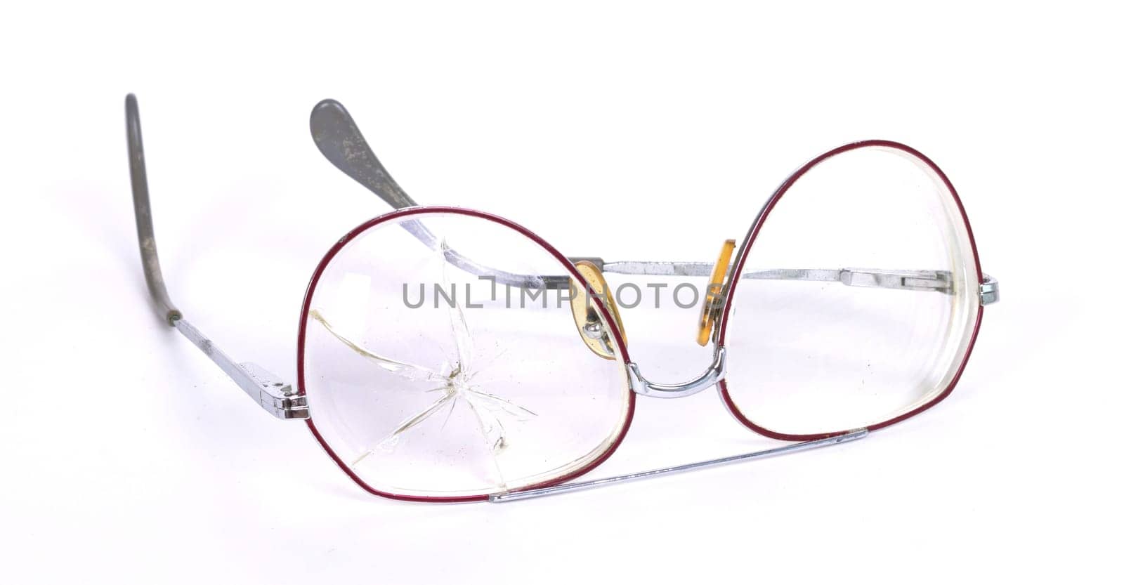 Vintage glasses, broken, isolated on a wwhite background