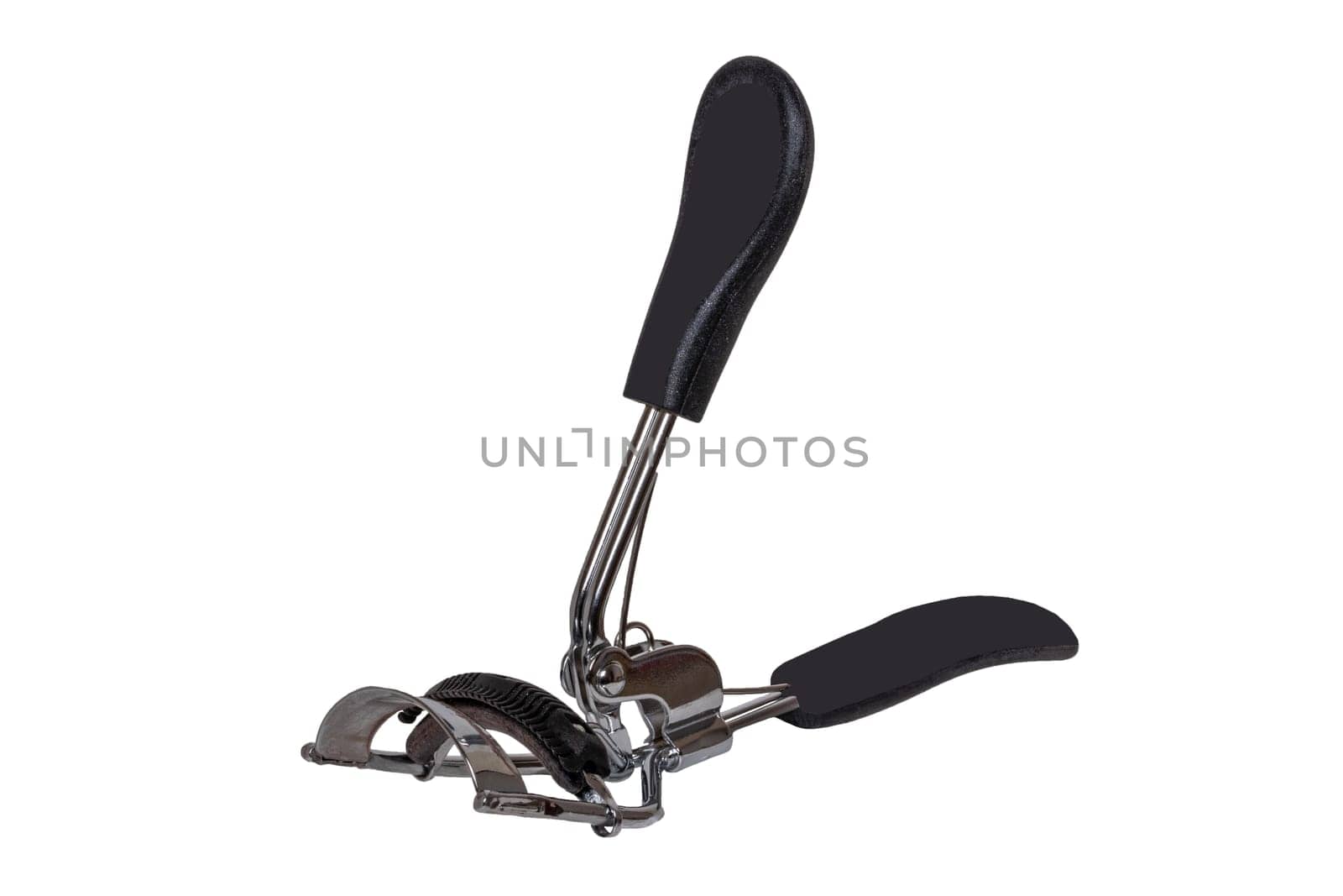 Concept beauty. Closeup eyelash curler or plier for eyelashes isolated on a white background.