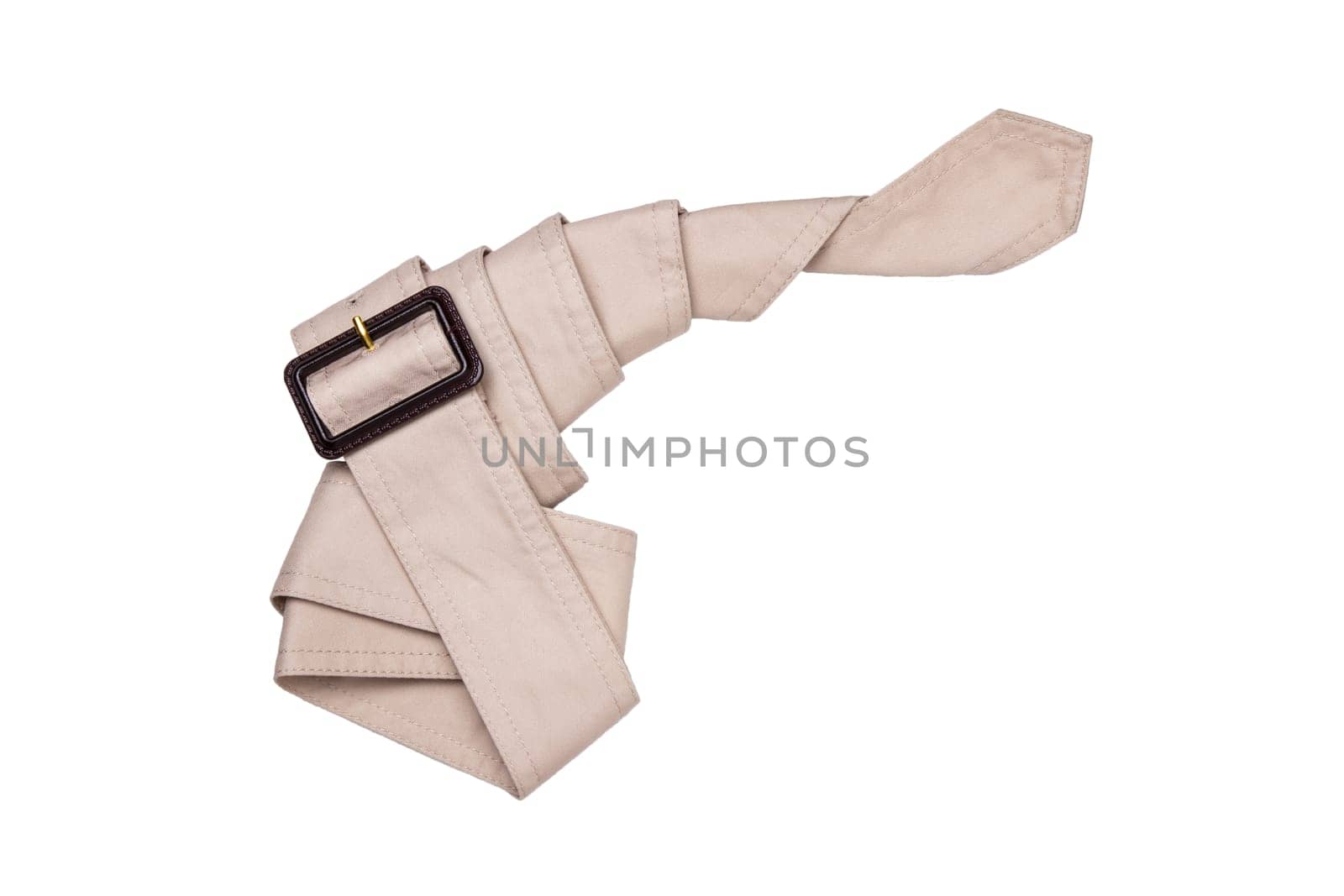 Belt isolated. Closeup of beige belt from a trench coat isolated on a white background. Woman belt.
