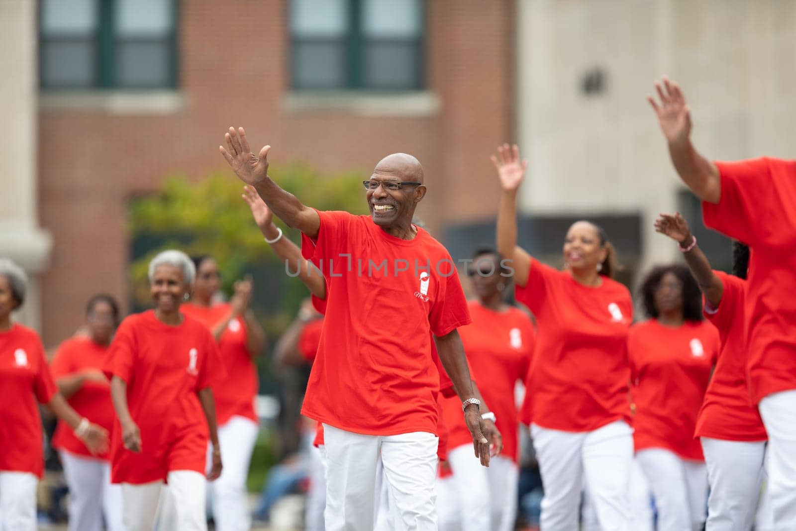 Indianapolis, Indiana, USA - September 22, 2018: The Circle City Classic Parade, Members of Young At Heart Senior Live Dancers, walking down the street