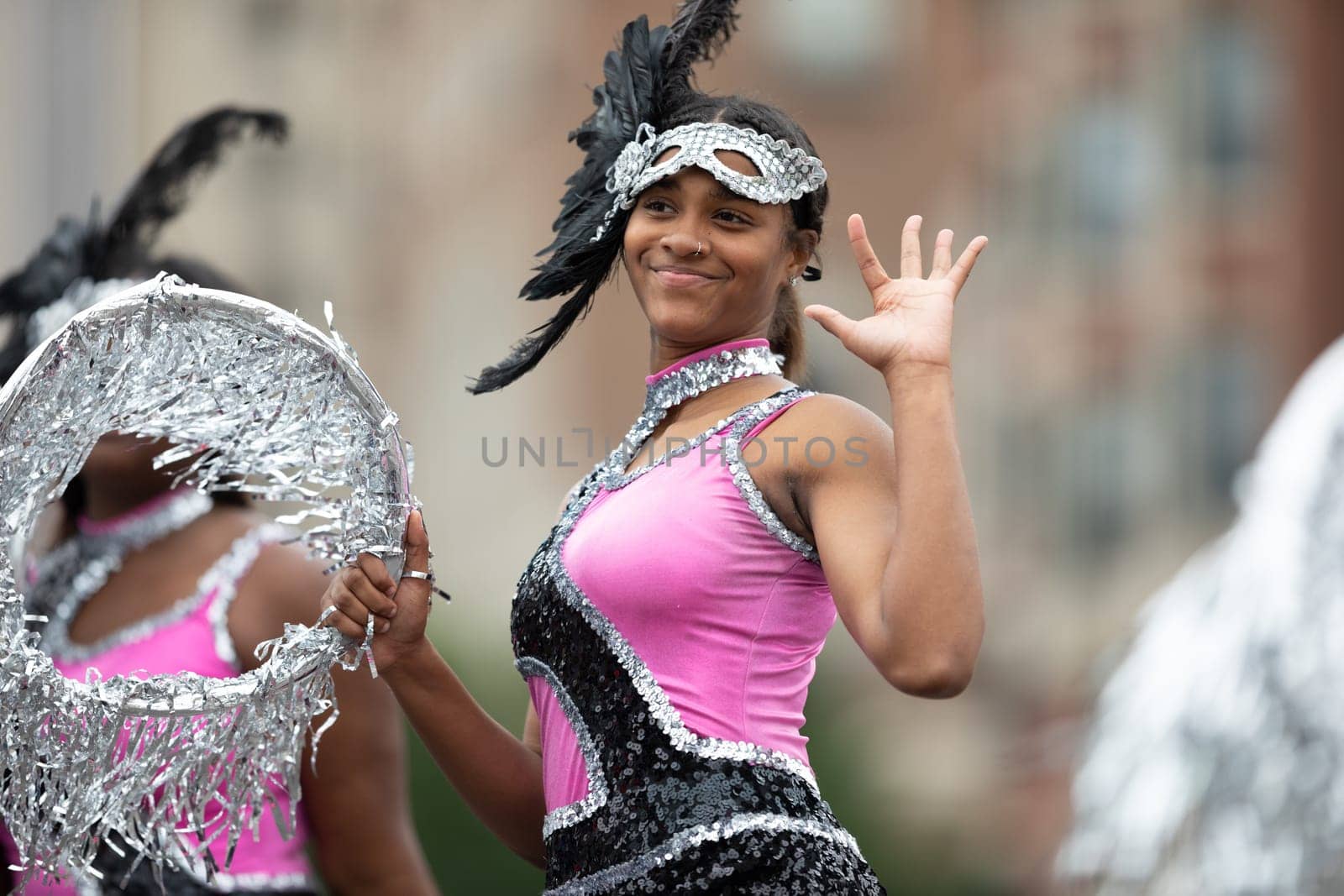 Indianapolis, Indiana, USA - September 22, 2018: The Circle City Classic Parade, Members of the Elite Striders drill tream dancing during the parade
