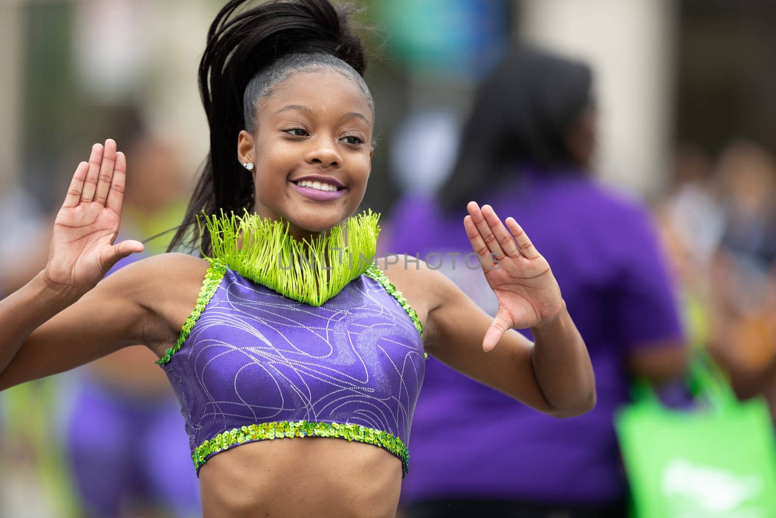Indianapolis, Indiana, USA - September 22, 2018: The Circle City Classic Parade, African american cheerleader dancing during the parade