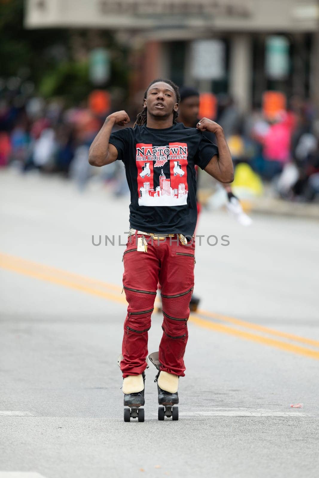Indianapolis, Indiana, USA - September 22, 2018: The Circle City Classic Parade, African american man on roller skates dancing during the parade