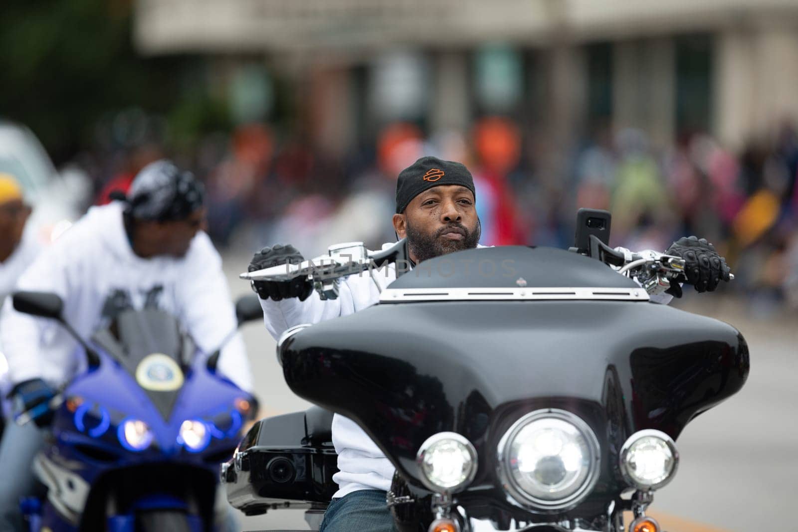 Indianapolis, Indiana, USA - September 22, 2018: The Circle City Classic Parade, African American Members of the 317 Ryders, riding motorcycles down the road at the parade