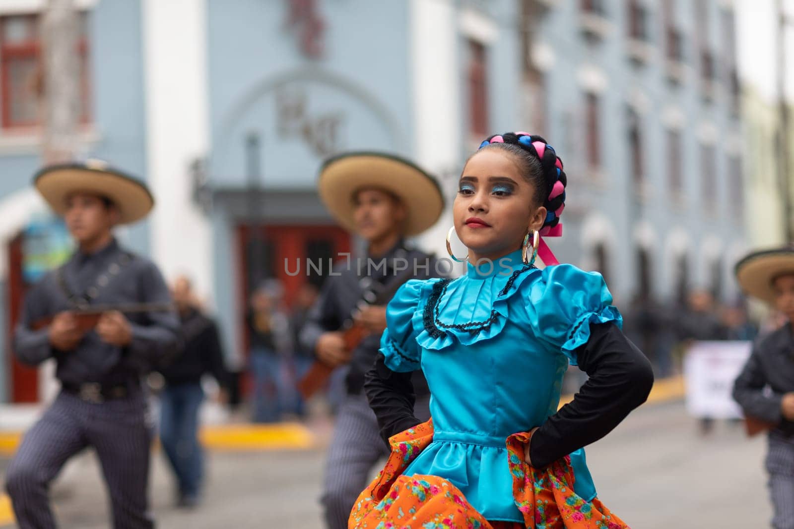 Matamoros, Tamaulipas, Mexico - November 20, 2018: The November 20 Parade, Young women wearing traditional Mexican clothing dancing