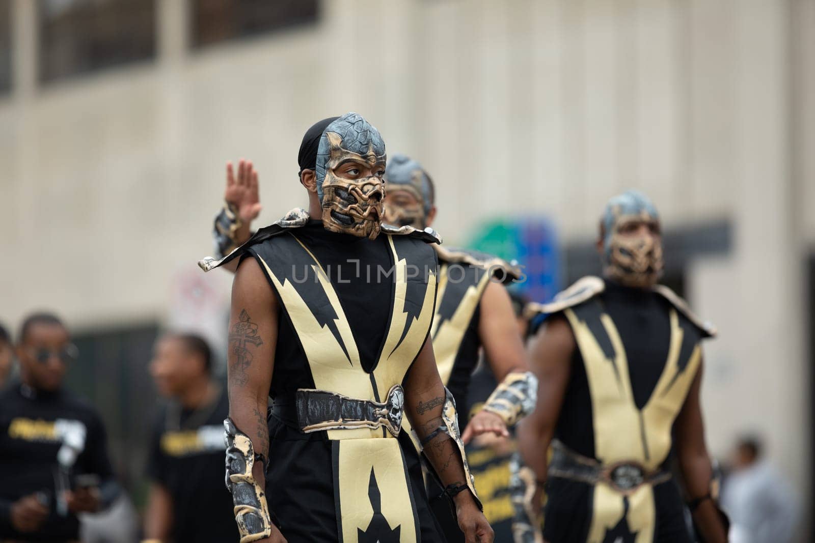 Indianapolis, Indiana, USA - September 22, 2018: The Circle City Classic Parade, Members of the Alpha Phi Alpha Fraternity INC dress up as Scorpion from mortal kombat at the parade