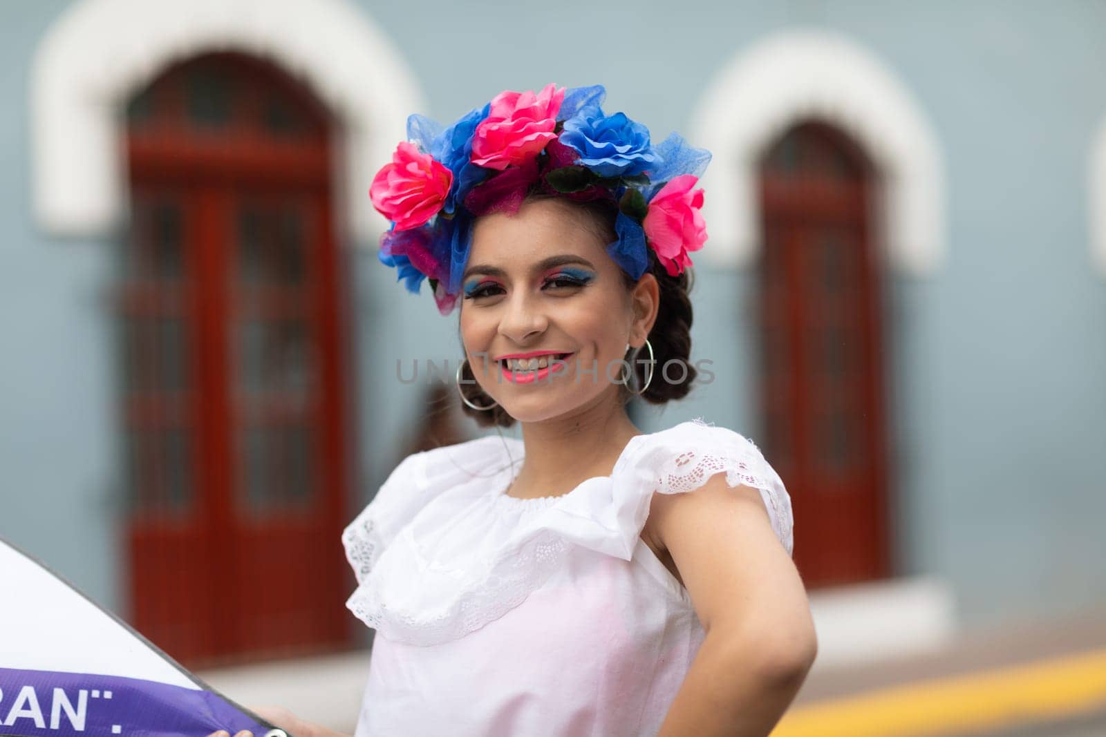 Matamoros, Tamaulipas, Mexico - November 20, 2018: The November 20 Parade, Young Woman wearing traditional Mexican clothing walking down the road