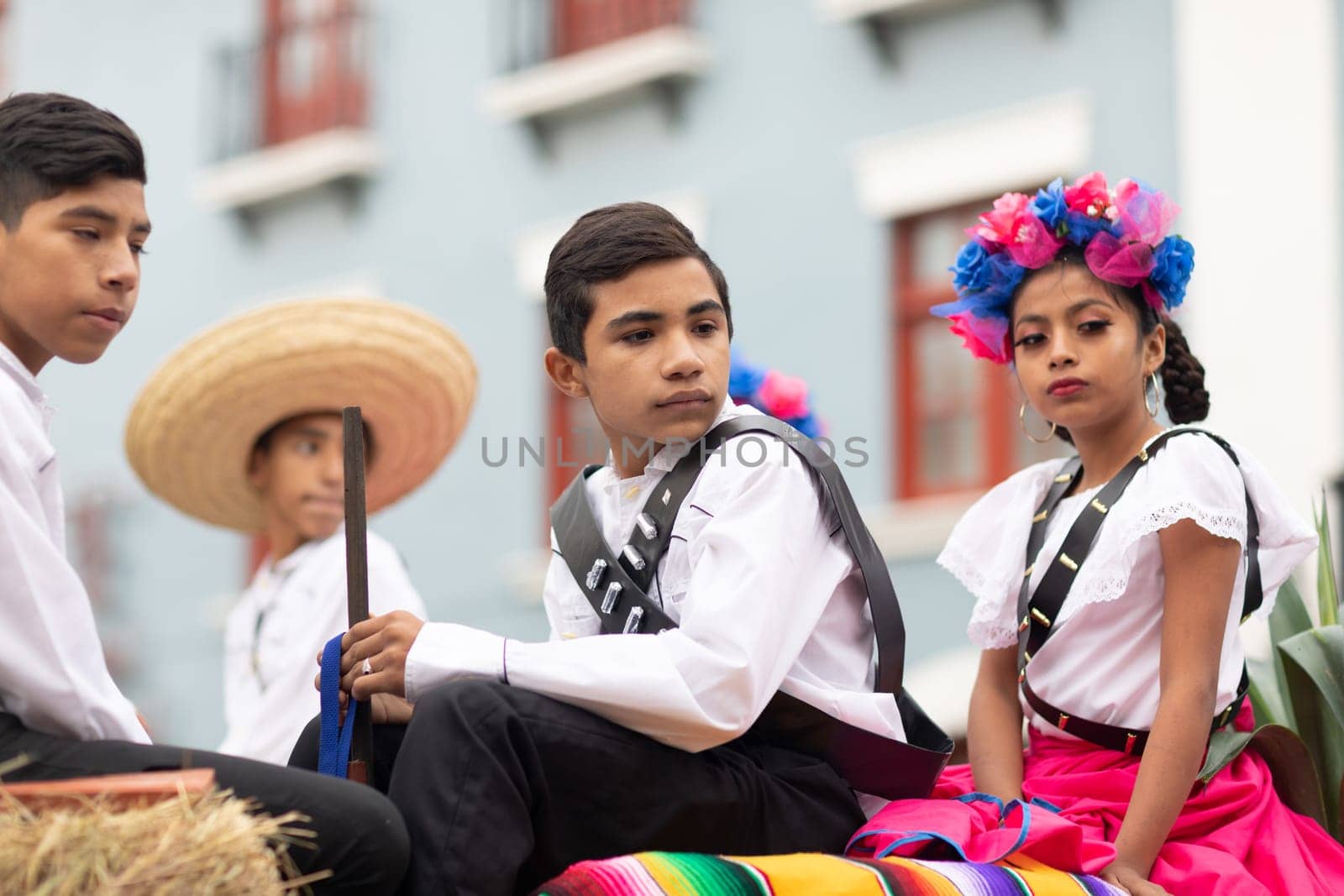 Matamoros, Tamaulipas, Mexico - November 20, 2018: The November 20 Parade, Young Boy wearing traditional mexican clothing holding a toy rifle during the parade