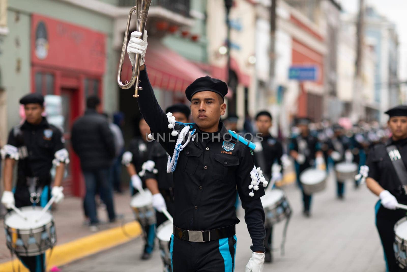 Matamoros, Tamaulipas, Mexico - November 20, 2018: The November 20 Parade, Marching Band with military Style uniform performing at the parade
