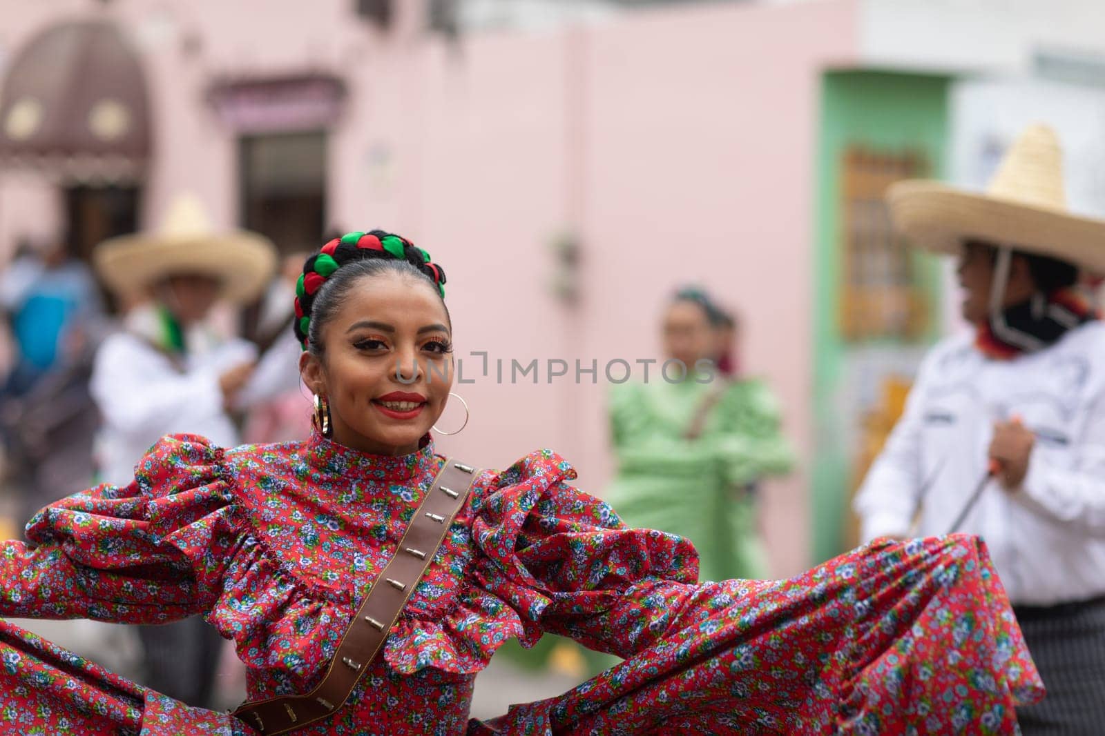 Matamoros, Tamaulipas, Mexico - November 20, 2018: The November 20 Parade, Young women and men dancing wearing traditional mexican clothing during the parade