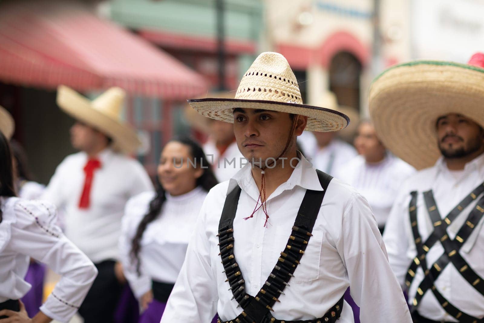 Matamoros, Tamaulipas, Mexico - November 20, 2018: The November 20 Parade, Young men wearing traditional mexican clothing with sombreros at the parade