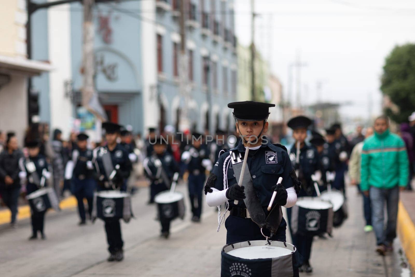Matamoros, Tamaulipas, Mexico - November 20, 2018: The November 20 Parade, Marching Band with military Style uniform performing at the parade