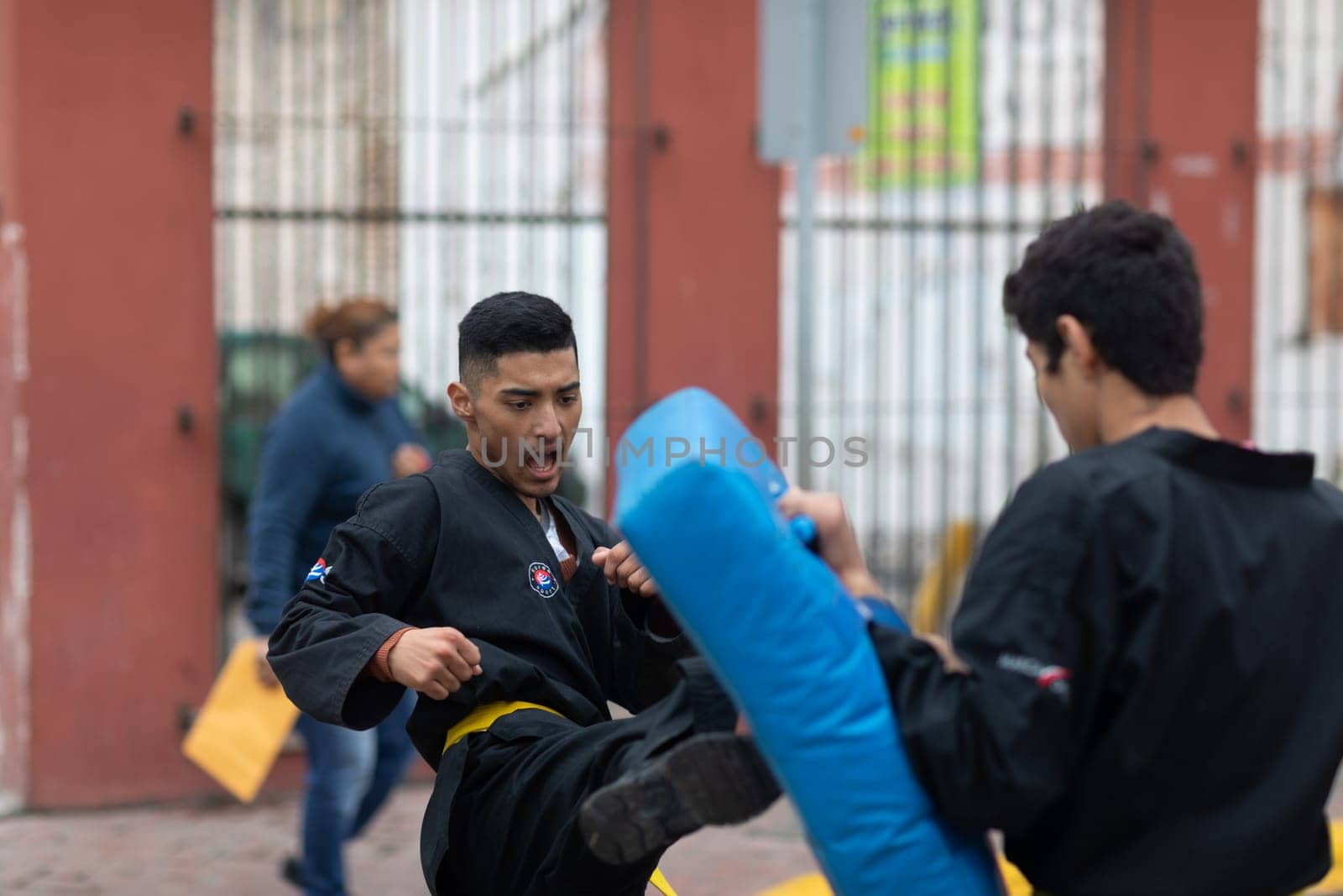Matamoros, Tamaulipas, Mexico - November 20, 2018: The November 20 Parade, Young men practicing martial arts during the parade