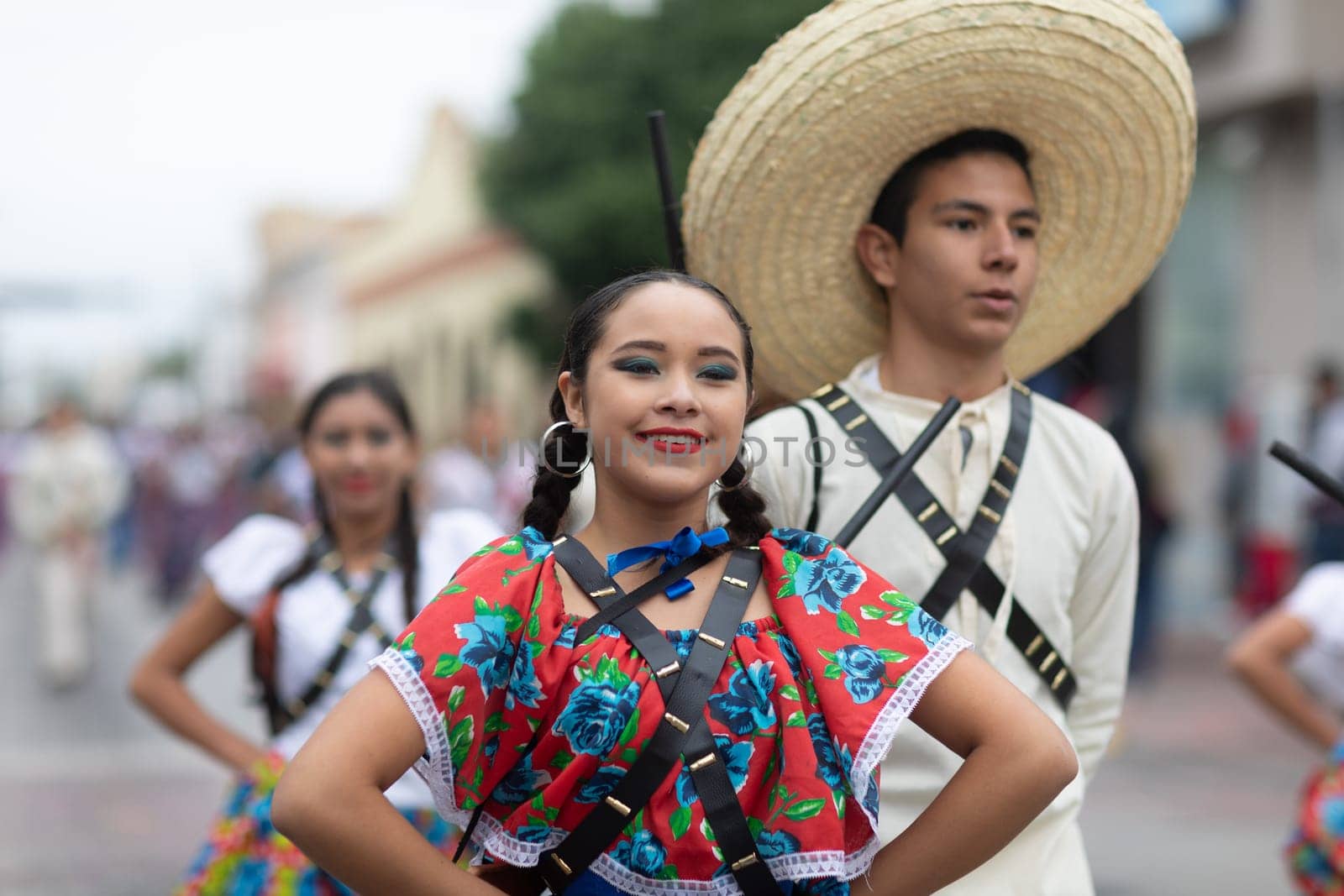 Matamoros, Tamaulipas, Mexico - November 20, 2018: The November 20 Parade, Young women wearing traditional Mexican clothing dancing