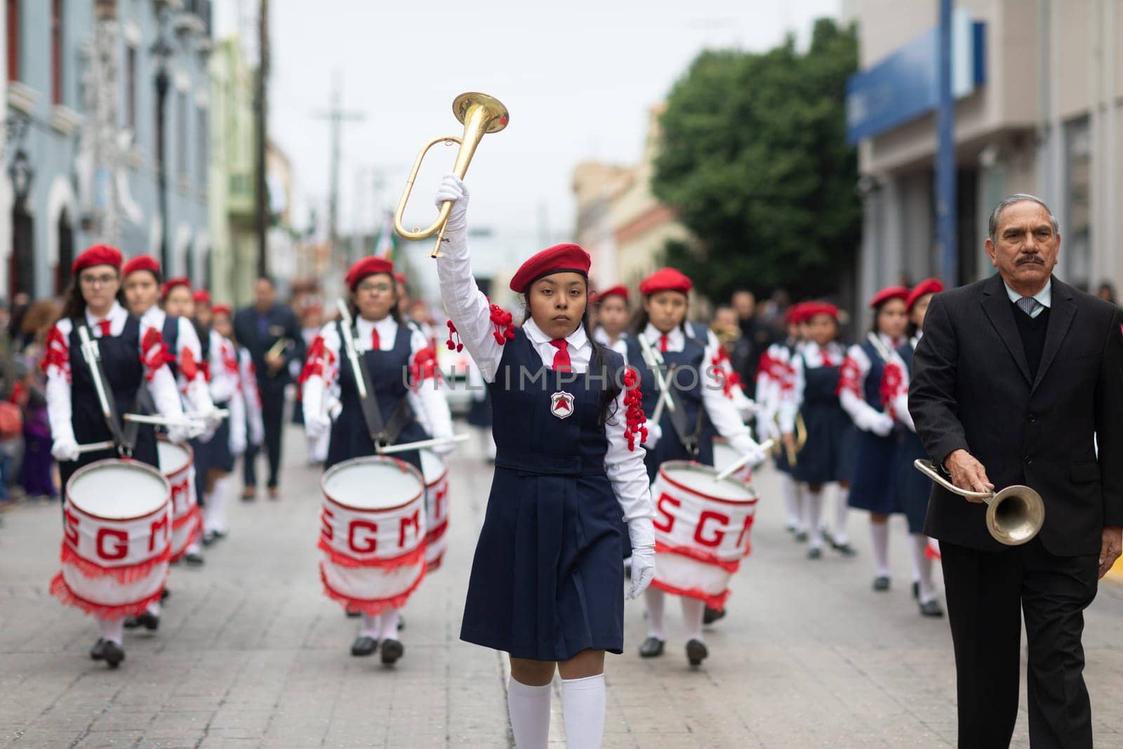 Matamoros, Tamaulipas, Mexico - November 20, 2018: The November 20 Parade, Marching Band with military Style uniform performing at the parade