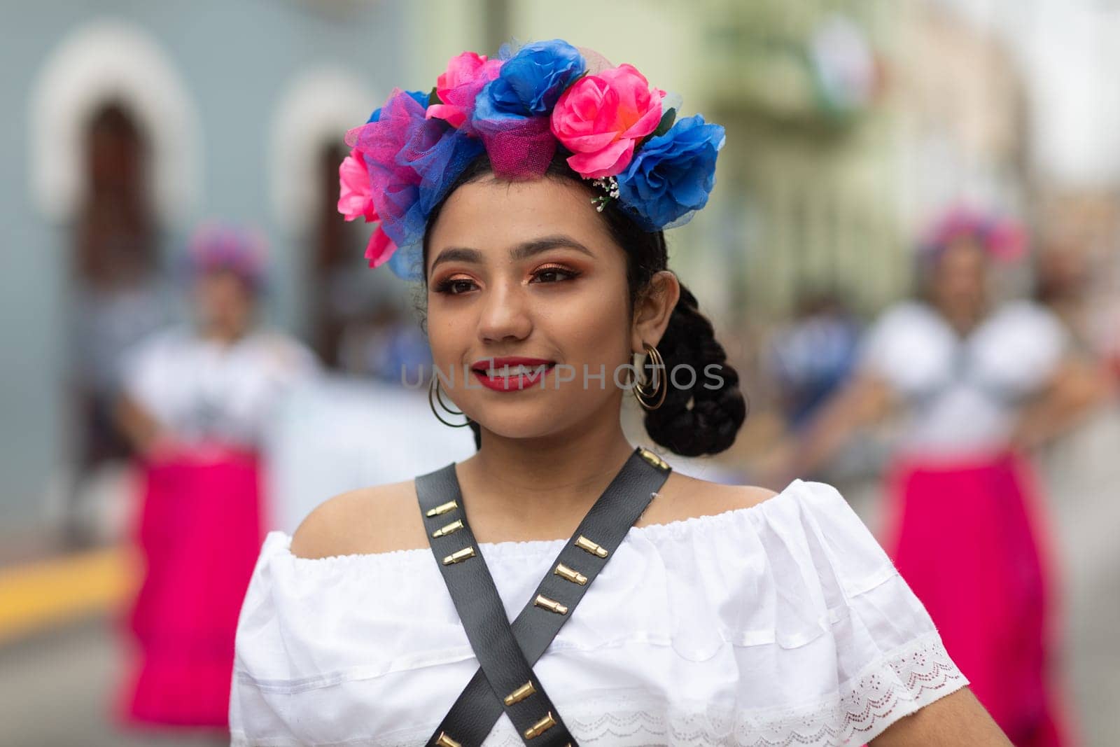 Matamoros, Tamaulipas, Mexico - November 20, 2018: The November 20 Parade, Young Woman wearing traditional Mexican clothing walking down the road