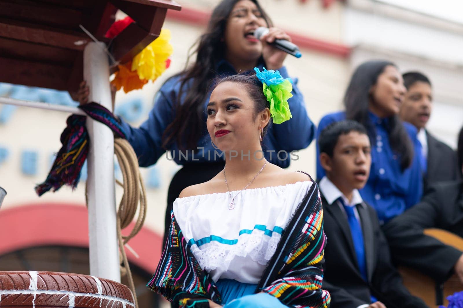 Matamoros, Tamaulipas, Mexico - November 20, 2018: The November 20 Parade, Young Mexican woman wearing traditional mexican clothing going down the road during the parade
