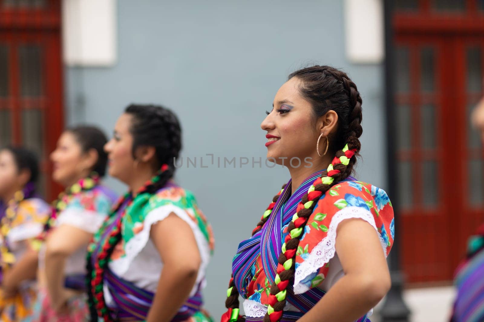 Matamoros, Tamaulipas, Mexico - November 20, 2018: The November 20 Parade, Young women wearing traditional Mexican clothing dancing