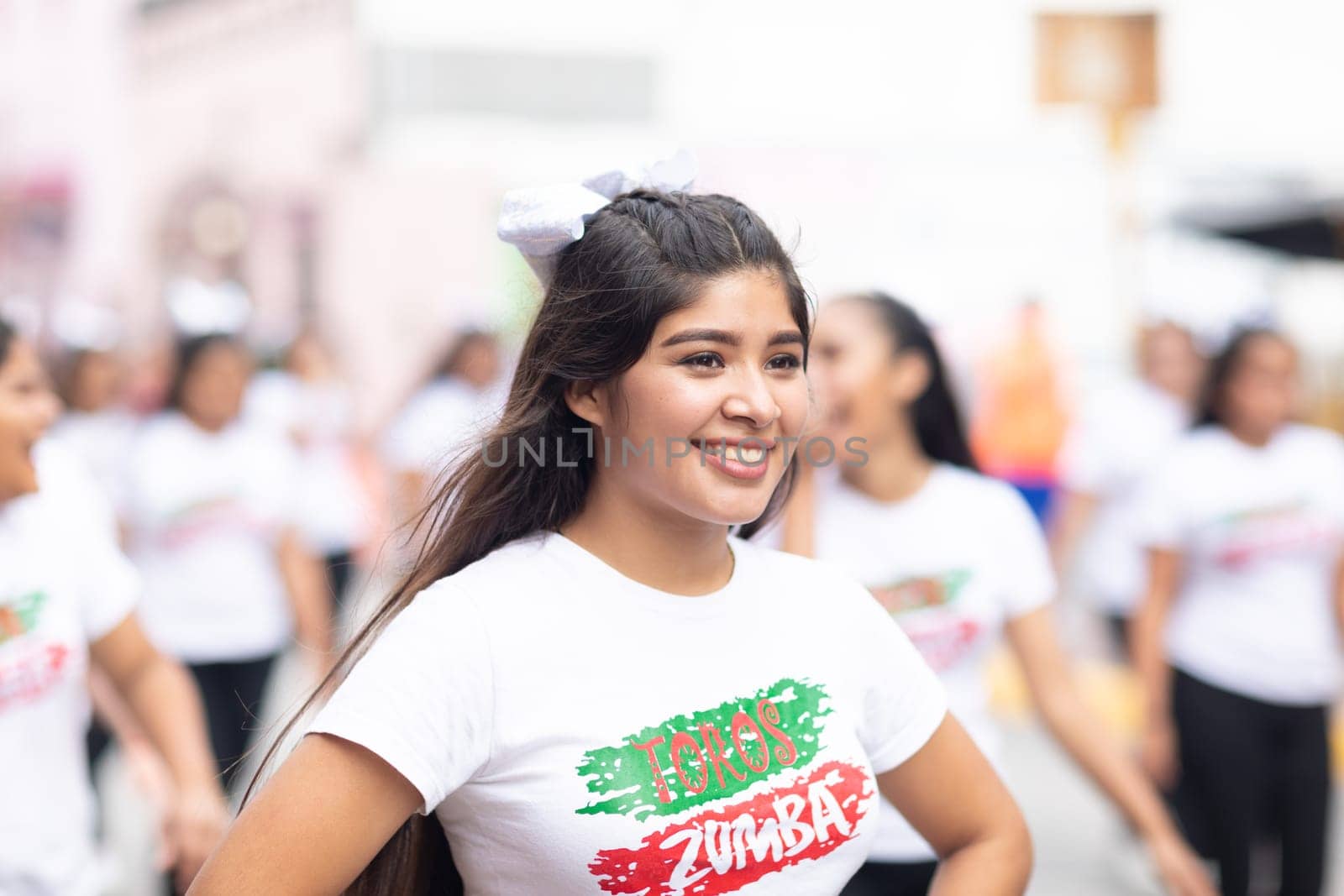 Matamoros, Tamaulipas, Mexico - November 20, 2018: The November 20 Parade, Young woman dancing zumba during the parade