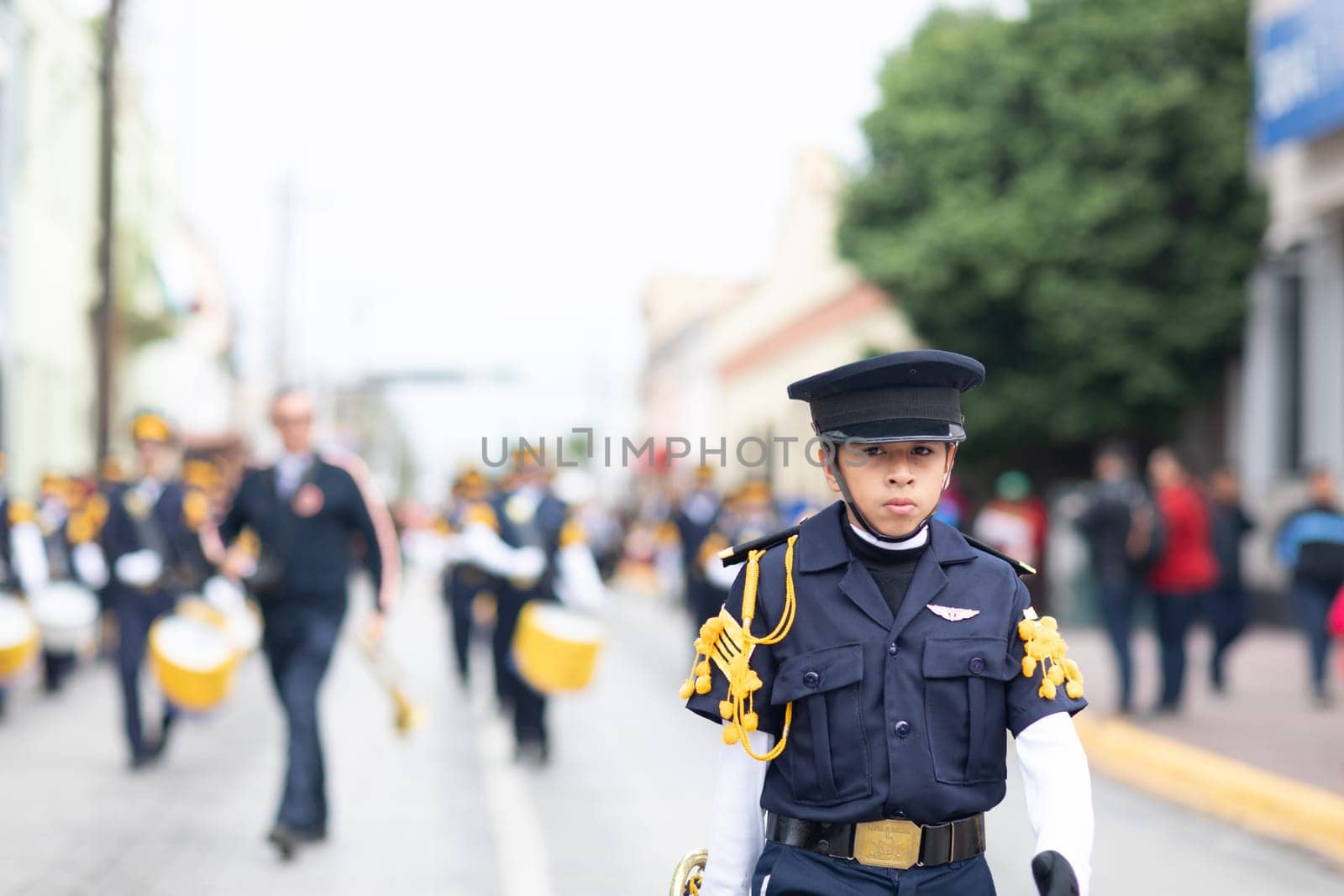 Matamoros, Tamaulipas, Mexico - November 20, 2018: The November 20 Parade, Marching Band with military Style uniform performing at the parade