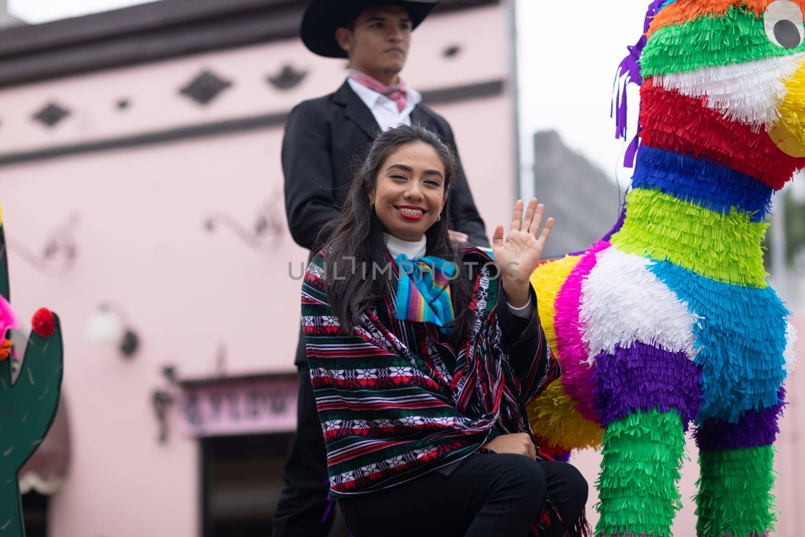Matamoros, Tamaulipas, Mexico - November 20, 2018: The November 20 Parade, Young Mexican woman wearing traditional mexican clothing going down the road during the parade