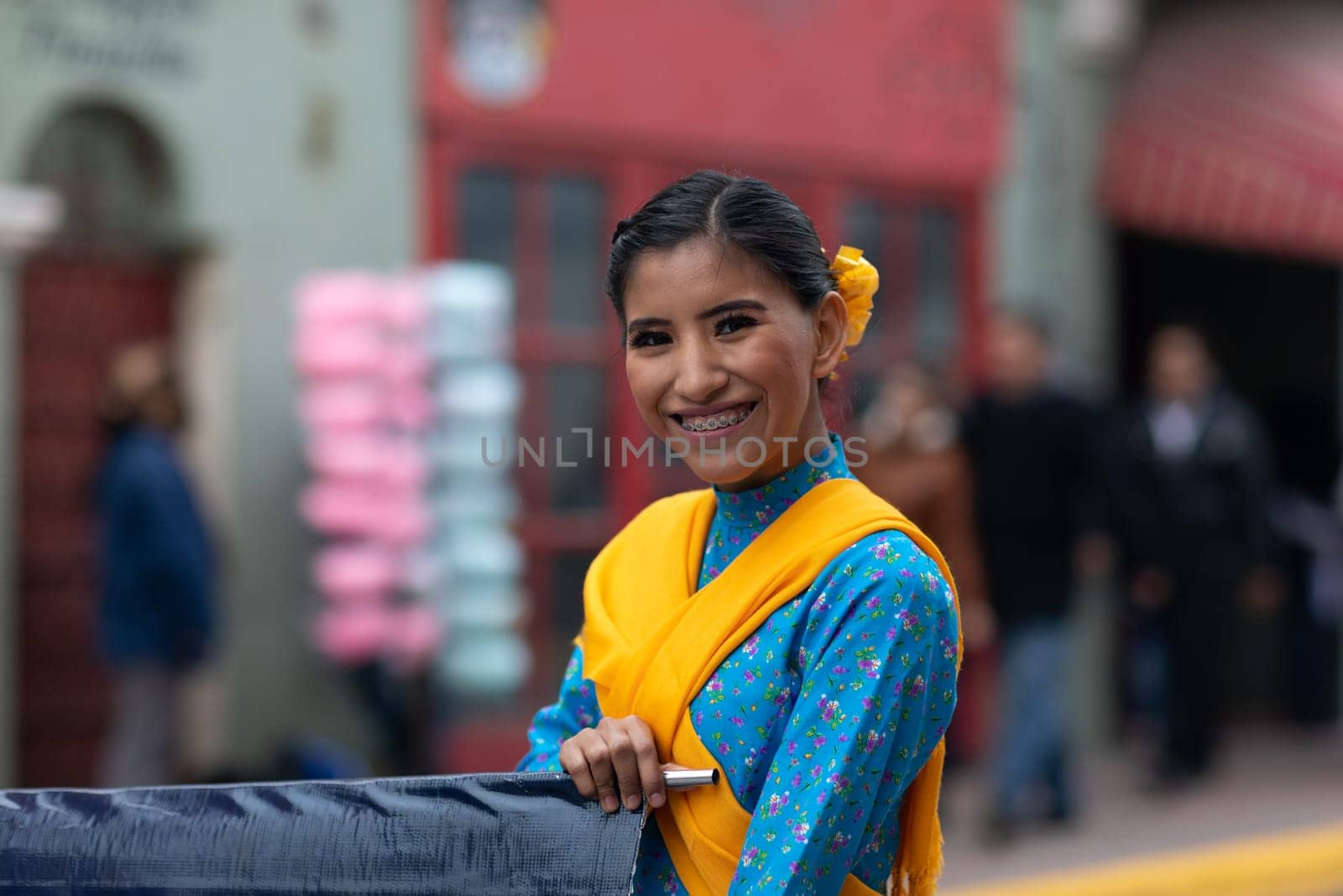 Matamoros, Tamaulipas, Mexico - November 20, 2018: The November 20 Parade, Young Mexican woman wearing traditional mexican clothing going down the road during the parade