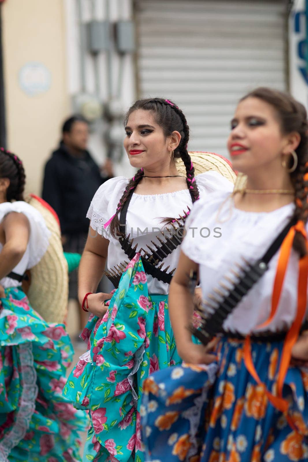 Matamoros, Tamaulipas, Mexico - November 20, 2018: The November 20 Parade, Young women wearing traditional mexican clothing dancing at the parade
