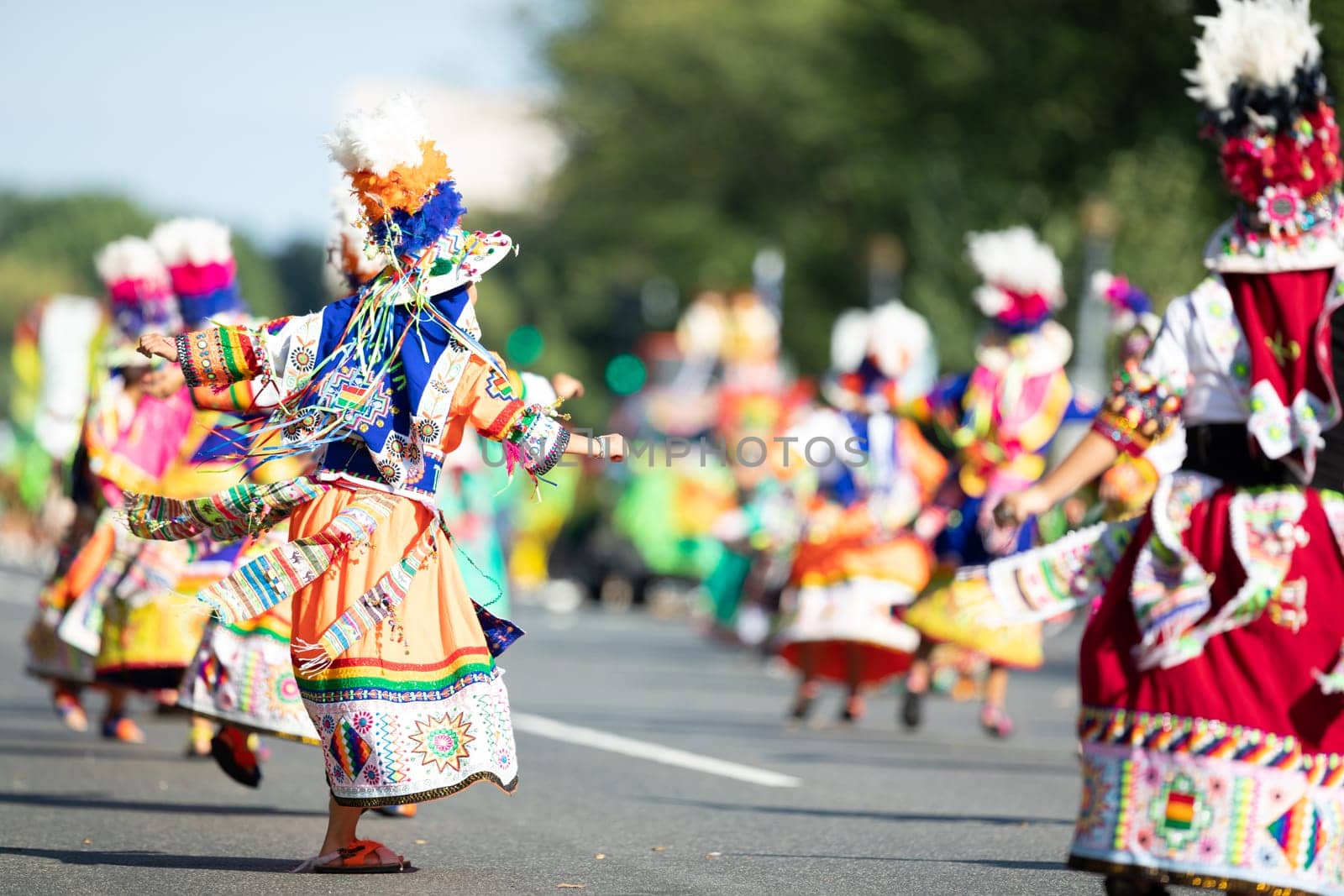Washington, D.C., USA - September 29, 2018: The Fiesta DC Parade, Bolivian women wearing traditional clothing performing a traditional dance from bolivia