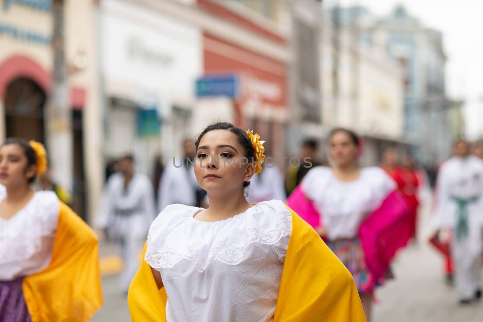 Matamoros, Tamaulipas, Mexico - November 20, 2018: The November 20 Parade, Young women wearing traditional Mexican clothing dancing