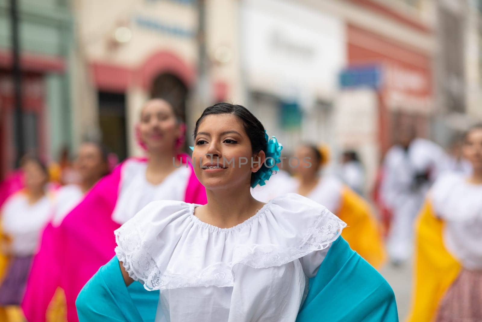 Matamoros, Tamaulipas, Mexico - November 20, 2018: The November 20 Parade, Young women wearing traditional Mexican clothing dancing